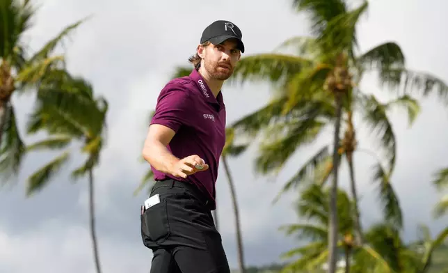 Patrick Rodgers reacts on the 13th green during the fourth round of the Sony Open golf event at the Waialae Country Club in Honolulu, Sunday, Jan. 18, 2026. (AP Photo/Matt York)