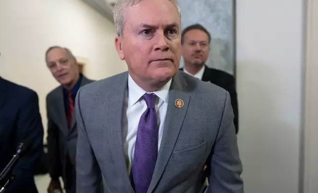 House Oversight Committee Chairman James Comer, R-Ky., leans in to hear a question as he speaks to reporters after former Secretary of State Hillary Clinton did not appear for a deposition as part of the panel's investigation into Jeffrey Epstein and those connected to him, at the Capitol in Washington, Wednesday, Jan. 14, 2026. (AP Photo/J. Scott Applewhite)