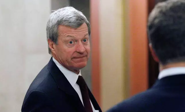 FILE - Sen. Max Baucus, D-Mont., enters the Speaker's office for a meeting about tax cuts on Capitol Hill in Washington, Dec. 1, 2010.(AP Photo/Alex Brandon, File)
