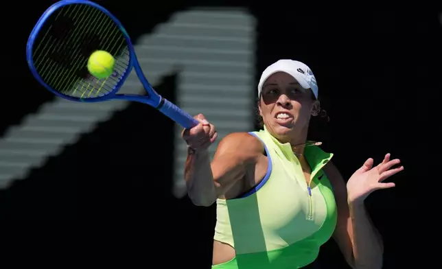 Madison Keys of the U.S. plays a forehand return to Karolina Pliskova of the Czech Republic during their third round match at the Australian Open tennis championship in Melbourne, Australia, Saturday, Jan. 24, 2026. (AP Photo/Dita Alangkara)