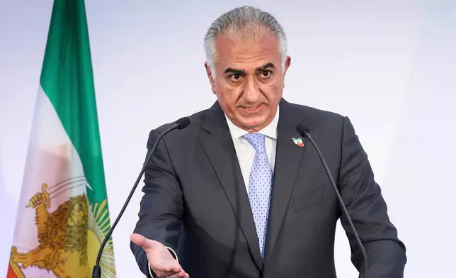 FILE - Reza Pahlavi, the son of Iran's toppled Shah Mohammad Reza Pahlavi, speaks during a news conference, June 23, 2025 in Paris. (AP Photo/Thomas Padilla, File)