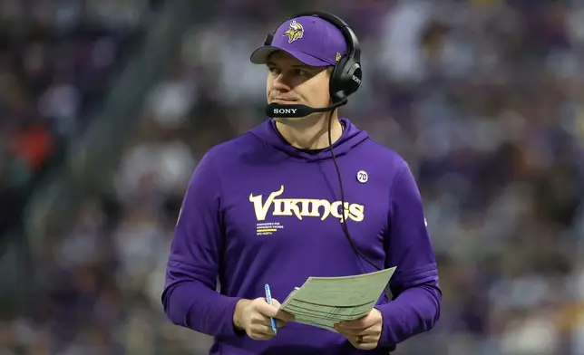 Minnesota Vikings head coach Kevin O'Connell watches from the sideline during the first half of an NFL football game against the Green Bay Packers, Sunday, Jan. 4, 2026, in Minneapolis. (AP Photo/Ellen Schmidt)