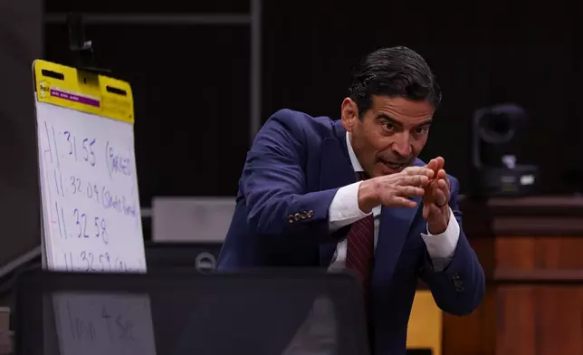 Defense attorney Nico LaHood cross-examines the prosecution's witness Nick Hill, a Texas Ranger lieutenant with the Texas Department of Public Safety, during the 10th day of the trial for former Uvalde school district police officer Adrian Gonzales at Nueces County Courthouse in Corpus Christi, Texas, Tuesday, Jan. 20, 2026. (Sam Owens/The San Antonio Express-News via AP, Pool)