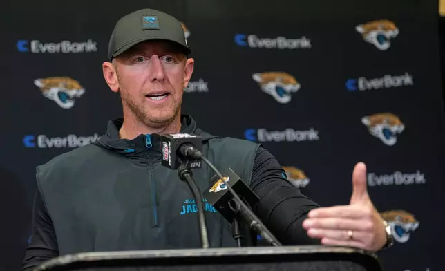 Jacksonville Jaguars head coach Liam Coen speaks during a news conference following an NFL football game against the Indianapolis Colts Sunday, Dec. 28, 2025, in Indianapolis. (AP Photo/Carolyn Kaster)