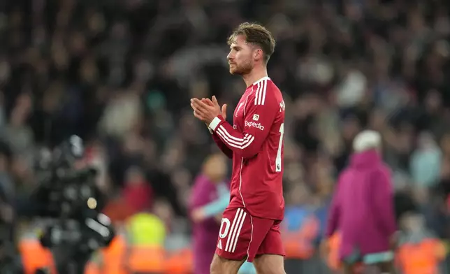 Liverpool's Alexis Mac Allister leaves the pitch after the English Premier League soccer match between Liverpool and Burnley in Liverpool, England, Saturday, Jan. 17, 2026. (AP Photo/Jon Super)