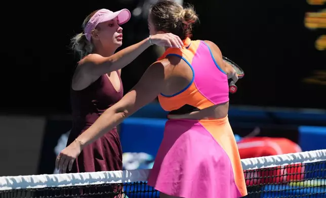 Aryna Sabalenka, right, of Belarus, is congratulated by Anastasia Potapova, left, of Austria following their third round match at the Australian Open tennis championship in Melbourne, Australia, Friday, Jan. 23, 2026. (AP Photo/Asanka Brendon Ratnayake)