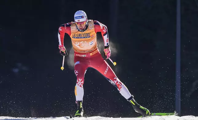 Norway's Johannes Høsflot Klæbo competes on his way to win the men's 20 km pursuit classic, part of the Tour de ski, cross-country skiing event, in Dobbiaco, Italy, Thursday, Jan. 1, 2026. (Terje Pedersen/NTB Scanpix via AP)