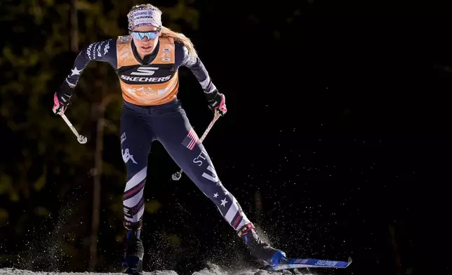 United States' Jessie Diggins competes on her way to win the women's 20 km pursuit classic, part of the Tour de ski, cross-country skiing event, in Dobbiaco, Italy, Thursday, Jan. 1, 2026. (Terje Pedersen/NTB Scanpix via AP)