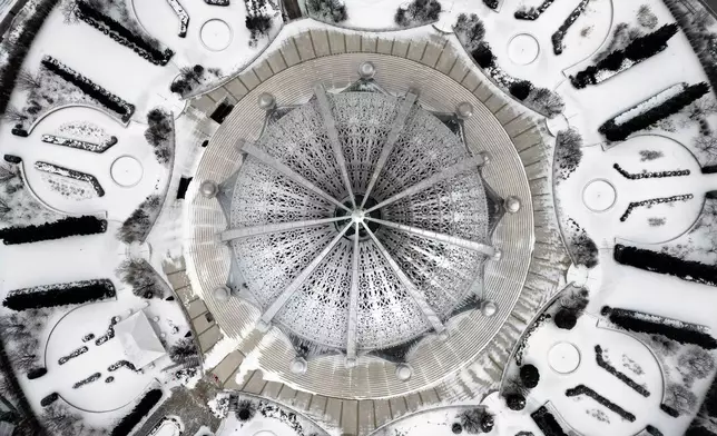 The Baháʼí House of Worship is seen from above on a snowy Friday, Jan. 30, 2026, in Wilmette, Ill.. (AP Photo/Erin Hooley)