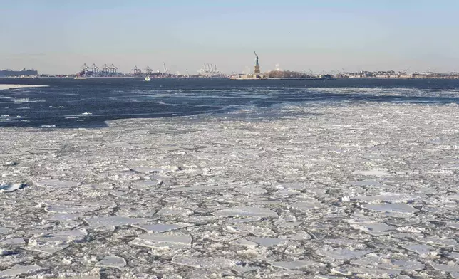 Ice floats on the Hudson River seen on the Staten Island Ferry, Tuesday, Jan. 27, 2026, in New York. (AP Photo/Yuki Iwamura)