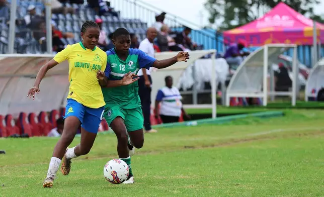 Girls participate in an U-17 tournament promoted by Africa's governing body to promote cervical cancer vaccination in Norton, Zimbabwe, Thursday, Dec. 18, 2025. (AP Photo/Aaron Ufumeli)