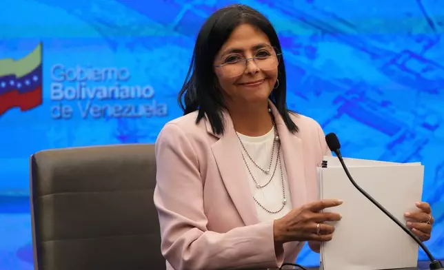 FILE - Venezuelan Vice President Delcy Rodriguez smiles during a press conference at the Miraflores presidential palace in Caracas Venezuela, Nov. 18, 2024. (AP Photo/Ariana Cubillos, File)