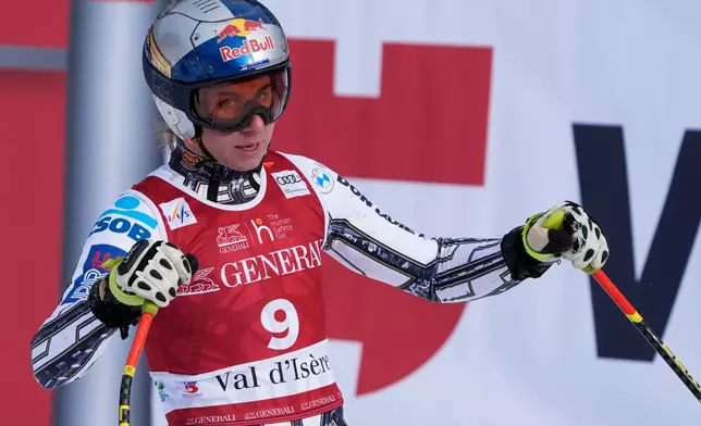 FILE - Czech Republic's Ester Ledecka checks her time at the finish area of an alpine ski, women's World Cup super-G in Val d'Isere, France, Sunday, Dec. 21, 2025. (AP Photo/Giovanni Auletta, File)
