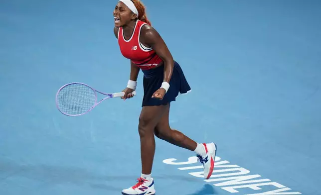 Coco Gauff of the U.S. celebrates her win over Iga Swiatek of Poland in their semifinal match at the United Cup tennis tournament in Sydney, Saturday, Jan. 10, 2026. (AP Photo/Rick Rycroft)