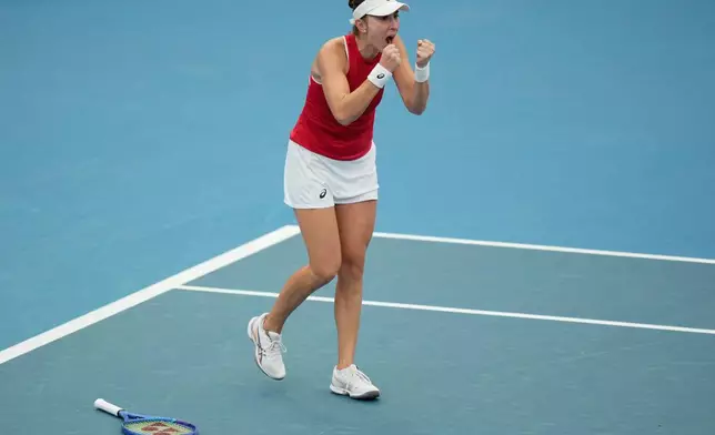 Belinda Bencic of Switzerland celebrates her win over Alise Mertens of Belgium in their semifinal match at the United Cup tennis tournament in Sydney, Saturday, Jan. 10, 2026. (AP Photo/Rick Rycroft)