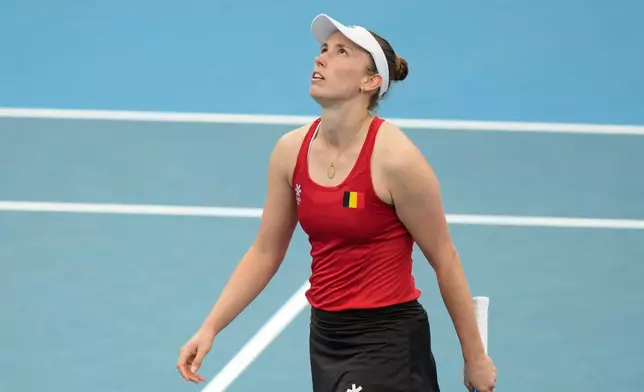Alise Mertens of Belgium looks up after a rally against Belinda Bencic of Switzerland in their semifinal match at the United Cup tennis tournament in Sydney, Saturday, Jan. 10, 2026. (AP Photo/Rick Rycroft)