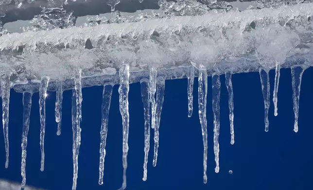 Icicles glisten in the sun at the Mzaar-Kfardebian ski resort northeast of Beirut, Lebanon, Saturday, Jan. 3, 2026. (AP Photo/Hassan Ammar)