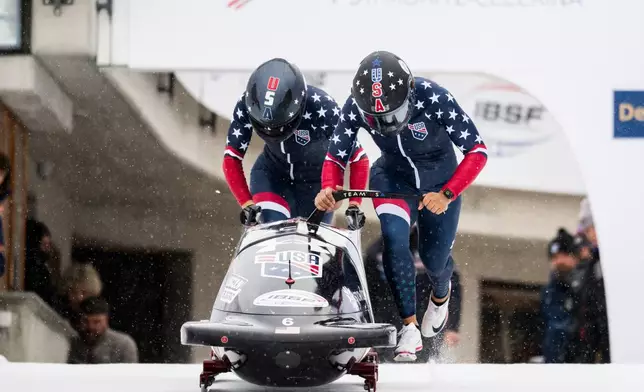Elana Meyers Taylor/Jadin O'Brien of the USA in action during the Women's 2-Bob World Cup, in St. Moritz, Switzerland, Sunday, Jan. 11, 2026. (Mayk Wendt/Keystone via AP)