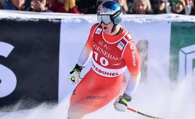 Switzerland's Franjo von Allmen reacts at finish line during a men's World Cup super-G, in Kitzbuehel, Friday, Jan. 23, 2026. (AP Photo/Marco Trovati)