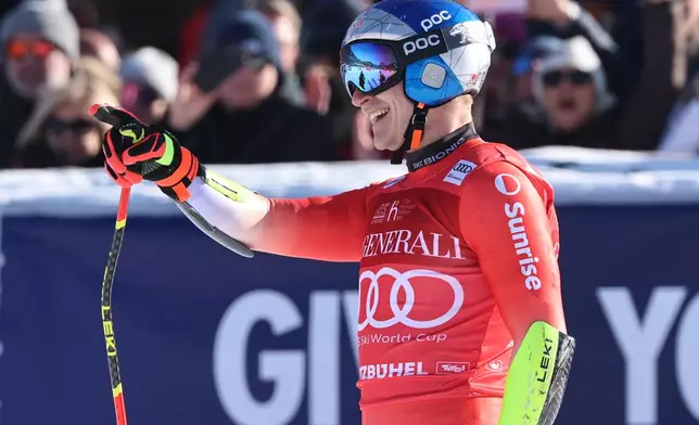 Switzerland's Marco Odermatt reacts at finish line during a men's World Cup super-G, in Kitzbuehel, Friday, Jan. 23, 2026. (AP Photo/Marco Trovati)