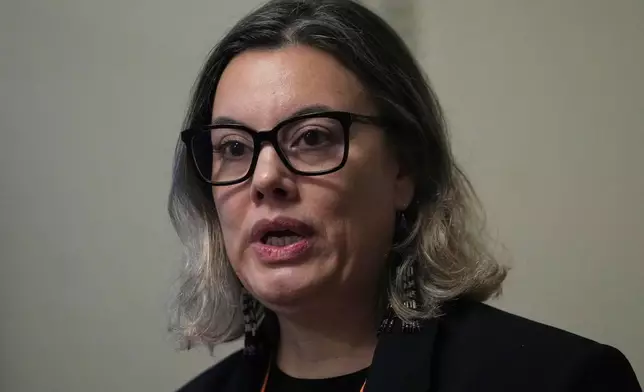 Naaja Nathanielsen, Greenland's Minister for Business, speaks during a press conference in the Houses of Parliament in London, England, Tuesday, Jan. 13, 2026. (AP Photo/Alastair Grant)