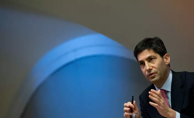 FILE - Kevin Warsh, speaking to the media about his report on transparency at the Bank of England, in London, Dec., 11, 2014. (AP Photo/Alastair Grant, Pool, File)