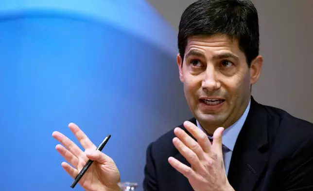 FILE - Kevin Warsh, speaking to the media about his report on transparency at the Bank of England, in London, Dec., 11, 2014. (AP Photo/Alastair Grant, Pool, File)