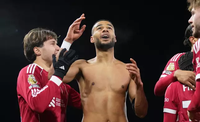 Liverpool's Cody Gakpo celebrates after scoring his side's second goal during the English Premier League soccer match between Fulham and Liverpool in London, Sunday, Jan. 4, 2026. (AP Photo/Alastair Grant)