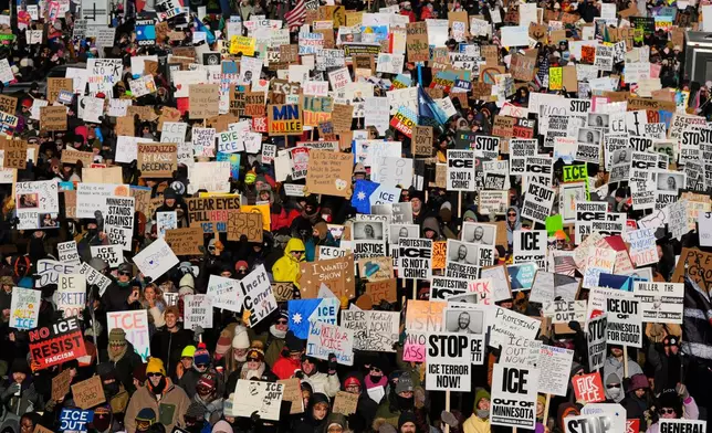 EDS NOTE: OBSCENITY - People gather during a protest Friday, Jan. 30, 2026, in Minneapolis. (AP Photo/Alex Brandon)