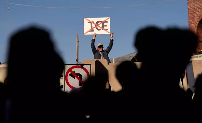 People fill the streets during a protest in Los Angeles on Friday, Jan. 30,2026. (AP Photo/Jae C. Hong)