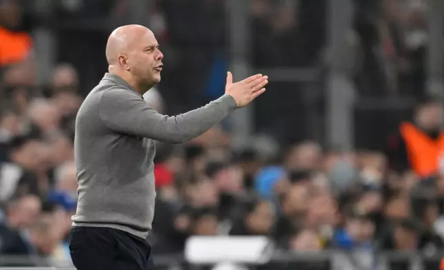 Liverpool's manager Arne Slot gestures during the Champions League opening phase soccer match between Marseille and Liverpool in Marseille, France, Wednesday, Jan. 21, 2026. (AP Photo/Philippe Magoni)