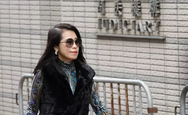 Teresa Lai, wife of pro-democracy media mogul Jimmy Lai arrives to the West Kowloon Magistrates' Courts to attend a hearing to hear arguments about the sentencing of Jimmy Lai, in Hong Kong, Monday, Jan. 12, 2026. (AP Photo/May James)