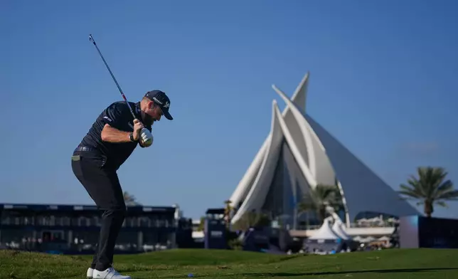 Shane Lowry of Ireland plays his second shot on the 18th hole during the final round of Dubai Invitational golf tournament in Dubai, United Arab Emirates, Sunday, Jan. 18, 2026. (AP Photo/Altaf Qadri)