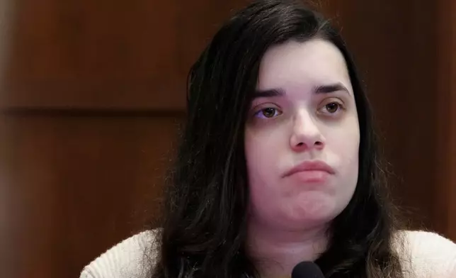 Juliana Peres Magalhães testifies during the double murder trial for Brendan Banfield in Fairfax County Circuit Court, Wednesday, Jan. 14, 2026, in Fairfax, Va. (AP Photo/Tom Brenner, Pool)