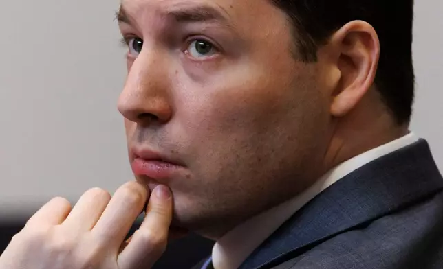 Brendan Banfield looks on during his double murder trial in Fairfax County Circuit Court, Wednesday, Jan. 14, 2026, in Fairfax, Va. (AP Photo/Tom Brenner, Pool)