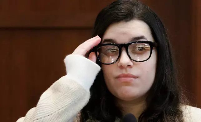 Juliana Peres Magalhães testifies during the double murder trial for Brendan Banfield in Fairfax County Circuit Court, Wednesday, Jan. 14, 2026, in Fairfax, Va. (AP Photo/Tom Brenner, Pool)