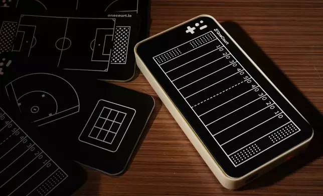 A OneCourt tablet, a tactile device that translates gameplay into trackable vibrations along with real-time audio, is pictured at the T-Mobile Innovation Hub Tuesday, Jan. 27, 2026, in Bellevue, Wash. (AP Photo/Lindsey Wasson)