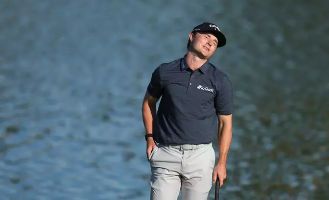 Blades Brown reacts to missing a birdie putt on the ninth hole, his final hole, scoring a 12-under-par 60 during the second round of the American Express golf event at the Jack Nicklaus Tournament Course at PGA West Friday, Jan. 23, 2026, in La Quinta, Calif. (AP Photo/Ross D. Franklin)