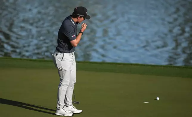 Blades Brown reacts to missing a birdie putt at the ninth hole, his final hole, scoring a 12-under-par 60 during the second round of the American Express golf event at the Jack Nicklaus Tournament Course at PGA West Friday, Jan. 23, 2026, in La Quinta, Calif. (AP Photo/Ross D. Franklin)