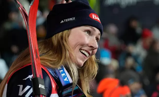 United States' Mikaela Shiffrin smiles after winning an alpine ski, women's World Cup slalom, in Flachau, Austria, Tuesday, Jan. 13, 2026. (AP Photo/Giovanni Auletta)