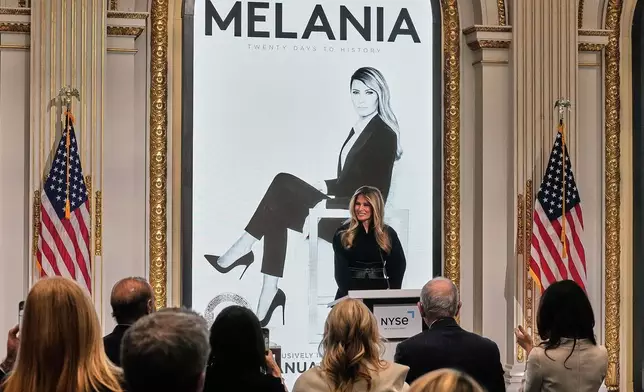 First lady Melania Trump delivers her remarks in the New York Stock Exchange board room before ringing the opening bell, Wednesday, Jan. 28, 2026. (AP Photo/Richard Drew)