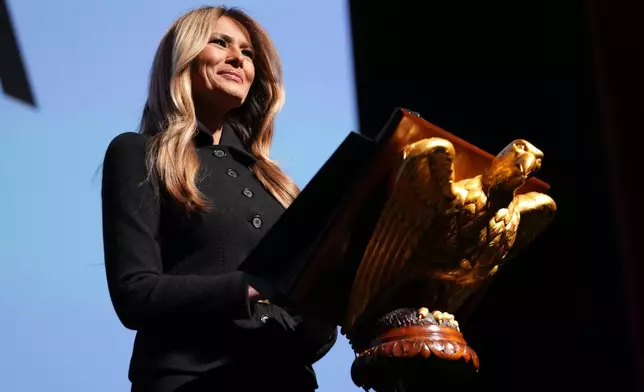 First lady Melania Trump speaks before the premiere of her movie "Melania" at The John F. Kennedy Memorial Center For The Performing Arts, Thursday, Jan. 29, 2026, in Washington. (AP Photo/Allison Robbert)