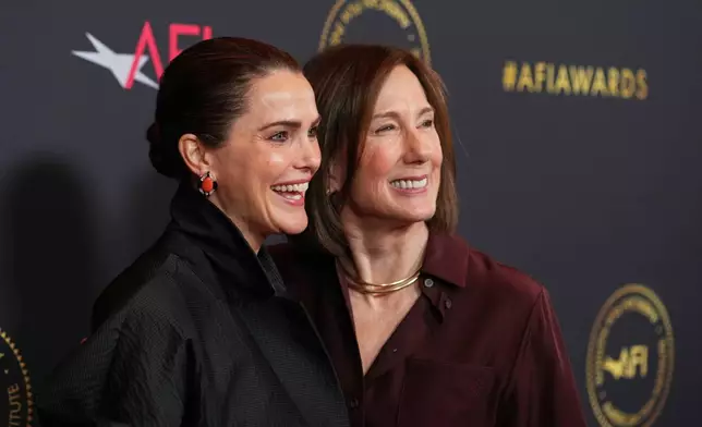 Actor Keri Russell, left, and producer Kathleen Kennedy pose together at the AFI Awards at the Four Seasons in Los Angeles, Friday, Jan. 9, 2026. (AP Photo/Chris Pizzello)