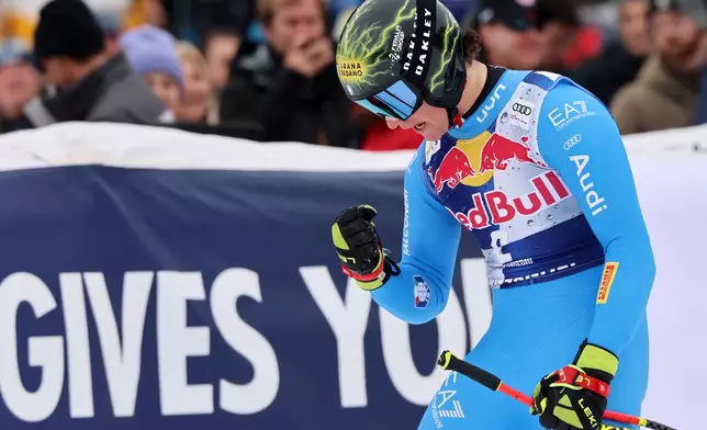 Italy's Giovanni Franzoni at the finish area of a men's alpine ski World Cup downhill, in Kitzbuehel, Austria, Saturday, Jan. 24, 2026. (AP Photo/Marco Trovati)