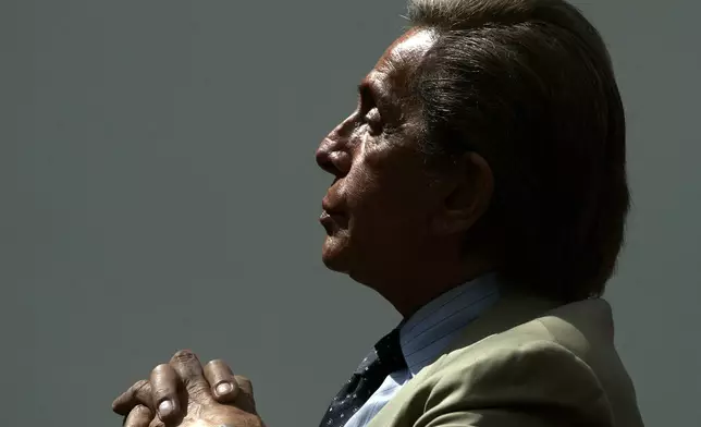 FILE - Italian fashion designer Valentino Garavani looks on during a press conference at Rome's Capitoline museums, Wednesday, June 13, 2007, on the occasion of the 45th anniversary of Valentino Maison foundation. (AP Photo/Gregorio Borgia, File)