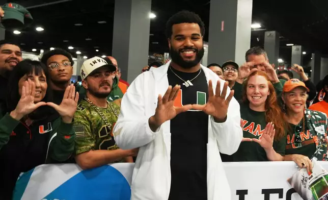 Miami defensive lineman Akheem Mesidor speaks during media day ahead of the College Football Playoff national championship game between Miami and Indiana, Sunday, Jan. 17, 2027, in Miami. The game will be played on Monday. (AP Photo/Marta Lavandier)