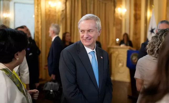 Chilean President-elect Jose Antonio Kast leaves a ceremony at the presidential palace in Panama City, Wednesday, Jan. 28, 2026. (AP Photo/Matias Delacroix)