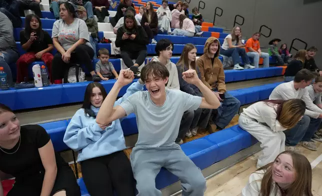 Students cheer during a basketball game at Water Canyon High School Friday, Dec. 5, 2025, in Hildale, Utah. (AP Photo/Rick Bowmer)