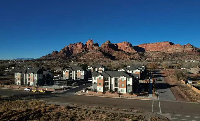 A modern apartment building is shown Friday, Dec. 5, 2025, in Colorado City, Ariz. (AP Photo/Rick Bowmer)