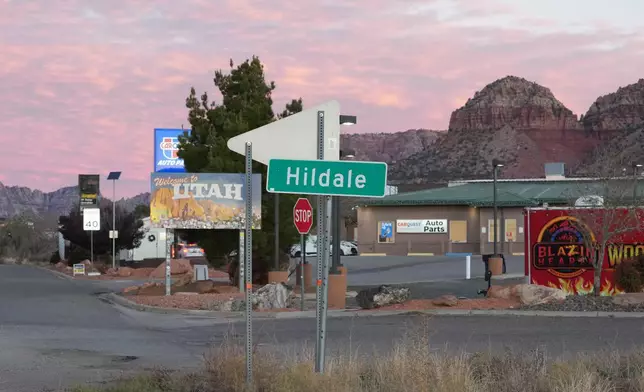 A sign marks the Utah state line in Hildale, Utah, on Saturday, Dec. 6, 2025. (AP Photo/Rick Bowmer)